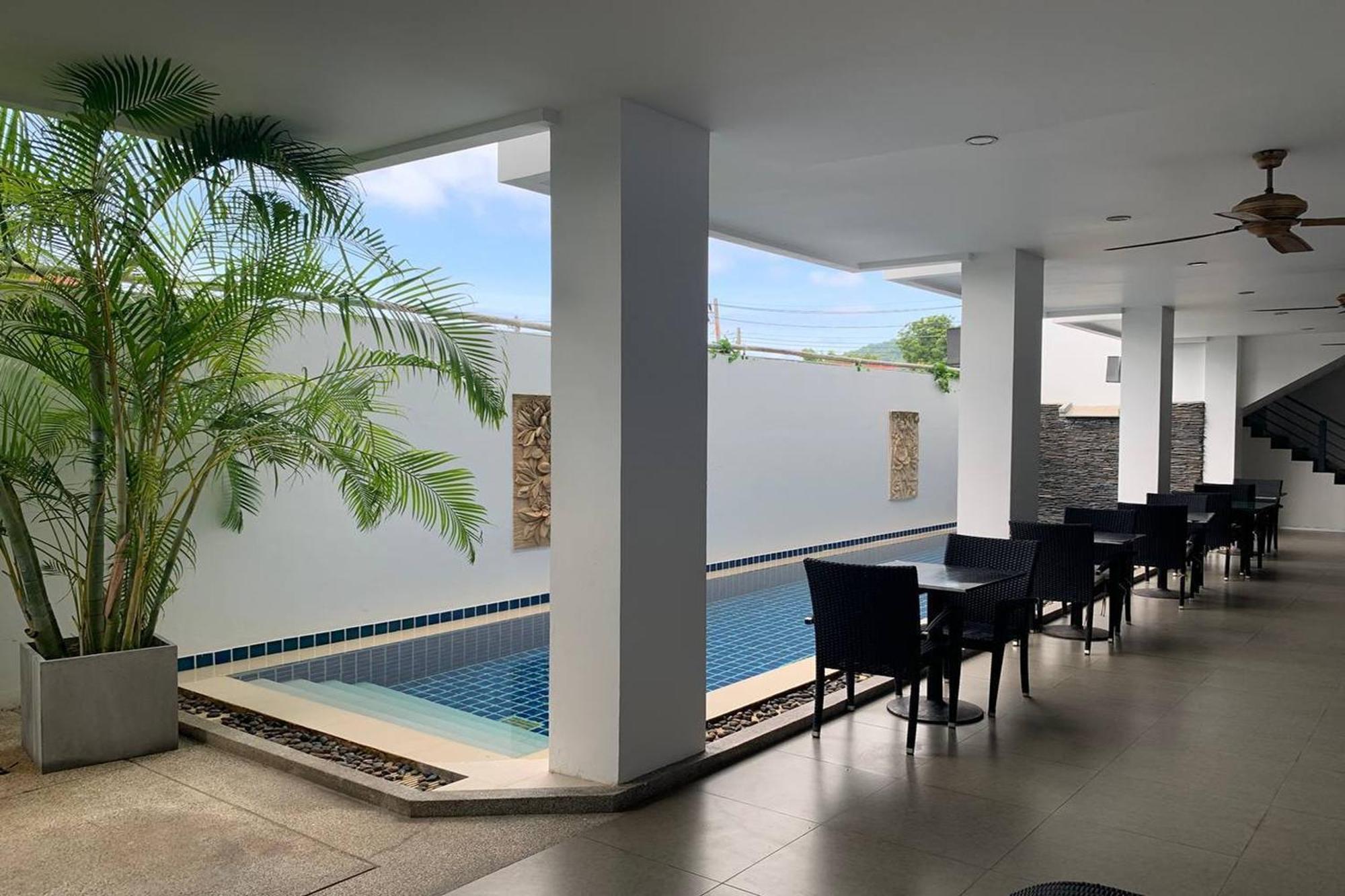 One World One Home Naiharn Hotel Rawai Extérieur photo